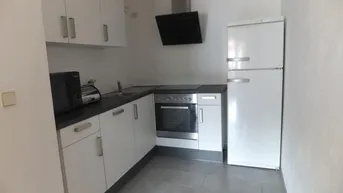 Expose Südausgerichtete 2-Zimmer Erdgeschosswohnung mit Balkon und Garage