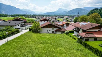 Expose Sonniges Baugrundstück in Niederndorf - Für Ihr Traumhaus mit Panoramablick