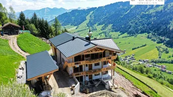 Expose Sonnige Erdgeschosswohnung mit Bergpanoramablick - Erstbezug
