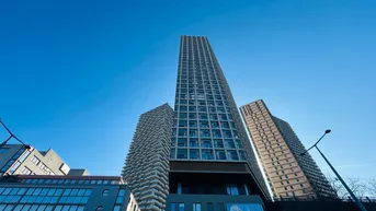 Expose PROVISIONSFREI! 31. STOCK! ERSTBEZUG! HELIO TOWER! 2. ZIMMER MIT 8m² LOGGIA! EINBAUKÜCHE! WEITBLICK.