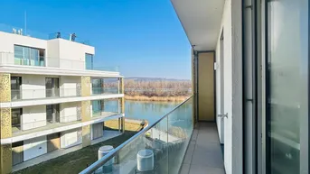 Expose PROVISIONFREI! ERSTBAZUG! DIREKTEM BLICK AUF DIE DONAU! THE SHORE! 1. STOCK! RUHIG! HELLE 2. ZIMMER MIT 7m² BALKON! CONCIERGESERVICE! FITNESS! SPA-BEREICH! EINBAUKÜCHE!
