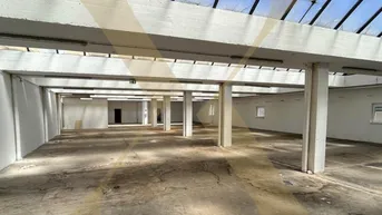 Expose Gewerbeobjekt mit Lagerflächen und bewilligter Planung für einen Autolift in Enns zu verkaufen!