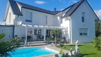 Expose ++NEU++ Exklusives Immobilienangebot: Zwei Einfamilienhäuser auf großzügigem Grundstück in Gänserndorf