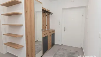 Heller Eingangsbereich mit modernem Garderobenschrank und Ablageflächen, ideal für den Empfang.