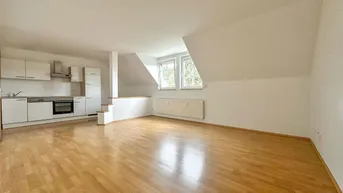 Expose Helle 2-Zimmer-Dachgeschosswohnung mit Fernwärme