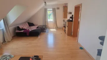 Expose  3-Zimmer Dachgeschosswohnung mit Garten