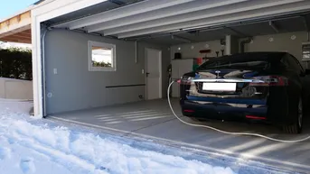 Expose Doppelgarage mit Carport für Skibegeisterte mit E-Ladeanschluss in Tauplitz