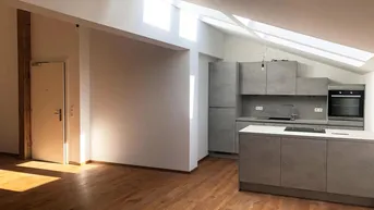 Expose Großzügige Dachgeschoßwohnung mitten im Stadtzentrum
