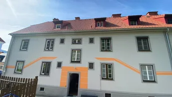 Expose Moderne Eigentumswohnung mit Garten und Carport