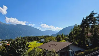 Expose Baugrund mit Panoramablick in Mieming