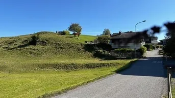 Expose sonniges Grundstück/Bauland am Hang