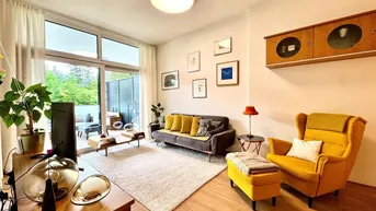 Expose Hugerburg: Loftartige Designerwohnung mit Terrasse und Tiefgaragenstellplatz