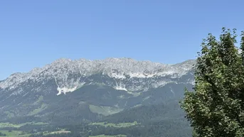 Expose Grundstück mit Bestand nahe der Schipiste mit traumhaftem Kaiserblick