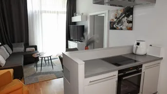Expose Exklusives Wohnen im 4**** Hotel "Das Sonnreich" - Moderne Eigentumswohnung (56m²) mit Balkon - neben der Therme Loipersdorf!