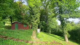 Expose Baugrundstück mit herrlicher Aussicht in Hanglage