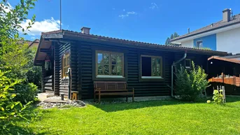 Expose Gepflegtes Holzhaus auf ebenem Grundstück in ruhiger Lage im Ortskern