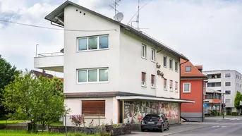 Expose Wohn- und Geschäftshaus mit Parkplätzen