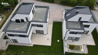 Expose Neubau - Wohnung mit großer Terrasse und Garten