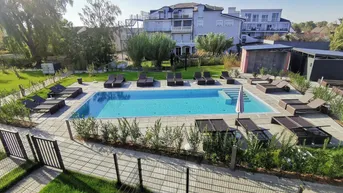 Expose Wohnen wie im Urlaub - mit Pools und Wellnessbereich in Top Lage - Strandbad Neusiedl in wenigen Minuten erreichbar!