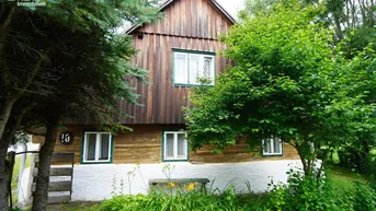 Expose Altes Stein-Holzblockhaus mit großem Garten in idyllischer Lage - perfekt für Naturliebhaber und Golfer!