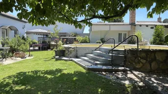 Expose Einfamilienhaus mit separater Wohneinheit, schönem Garten mit Swimming Pool und Garage!
