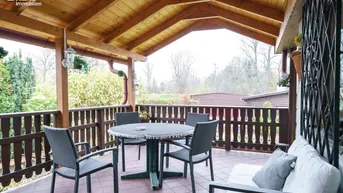 Expose Idyllische Liegenschaft am Neufelder See - Ferienhaus mit 91m², 4 Zi., Terrasse, Garten, Wellnessbereich, Keller und Carport!