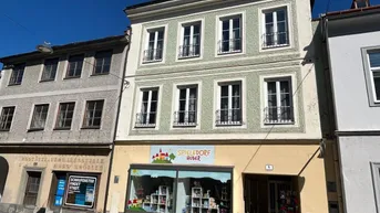 Expose Wohn- und Geschäftshaus in zentraler Lage