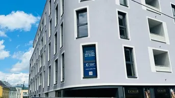 Expose Traumhafte 2-Zimmer-Wohnung mit Balkon Richtung Innenhof – Erstbezug