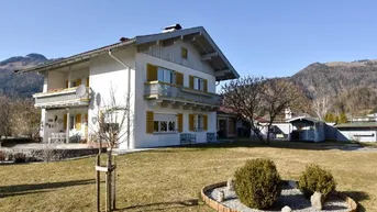 Expose Gepflegtes Einfamilienhaus mit großem Garten im Zentrum von Kössen zu verkaufen