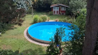 Expose Charmantes Einfamilienhaus in Bestlage von Wien-Mauer – mit Pool, Garten und viel Privatsphäre | ZΞLLMANN IMMOBILIEN