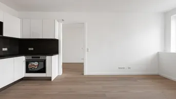 Expose BEFRISTET VERMIETET BIS 10/2027 II HELLE 2 ZIMMER DACHGESCHOSSWOHNUNG NÄHE DONAUKANAL UND TRIIIPLE // MODERNE MARKENKÜCHE MIT GERÄTEN