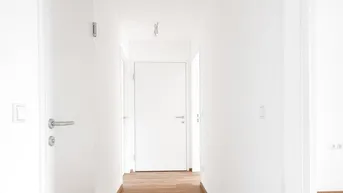 Expose ERSTBEZUG mit ca. 8 m² LOGGIA | 3-Zimmer Neubau | Fernwärme | TG-Stellplatz optional | Nachhaltiges Wohnbauprojekt