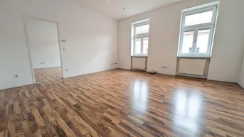 Expose ALTBAUJUWEL: Großzügig geschnittene 2-Zimmer Wohnung mit Balkon und Klimaanlage in ruhiger Wohnlage