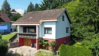 Expose Einfamilienhaus mit Fernblick ins Grüne | Garage &amp; Carport-Stellplatz | Südwest-Terrasse mit Sonnenschutz | Absolute Ruhelage I Voll unterkellert