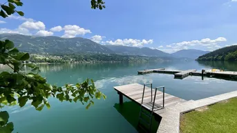 Expose WOHNEN AM WASSER - BEGEHRT WIE NIE! EIGENTUMSWOHNUNG MIT EIGENEM SEEGRUNDSTÜCK (DIREKTER, PRIVATER SEEZUGANG) SOWIE BOOTSANLEGEPLATZ IN GIGANTISCHER NATURLAGE AM MILLSTÄTTER SEE