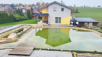 Expose Einfamilienhaus mit großem Garten und Schwimmteich