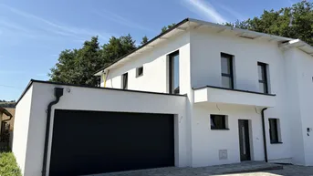 Expose Moderne belagsfertige Doppelhaushälfte mit Garten, Doppelgarage und 4 Schlafzimmern