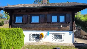 Expose Idyllisches Holzblockhaus in Naturrandlage