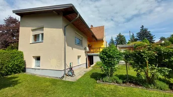 Expose EINFAMILIENHAUS MIT GARAGE AUF EINEM TRAUMHAFTEN GRUNDSTÜCK