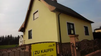 Expose Einfamilienhaus auf großem Grundstück!