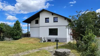 Expose Zweifamilienhaus mit weitläufigem Garten