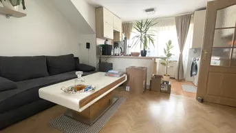 Expose Renovierte und Kompakte 2-Zimmer Dachgeschoss Wohnung