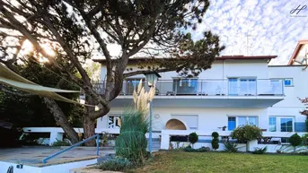 Expose Dreifamilienhaus mit eigenem Seezugang in Leopoldsdorf bei Wien.