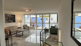 Expose Helle Maisonettewohnung mit Balkon und Tiefgaragenplatz