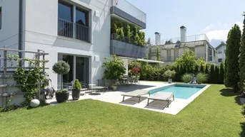 Expose Designer-Wohnung mit großzügigem Garten und Pool