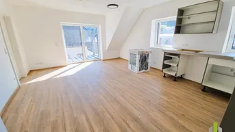 Expose Erstbezug! Moderne 2-Zi.-Dachgeschoß-Wohnung mit großen Balkon