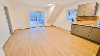 Expose Erstbezug! Moderne 2-Zi.-Dachgeschoß-Wohnung mit großen Balkon