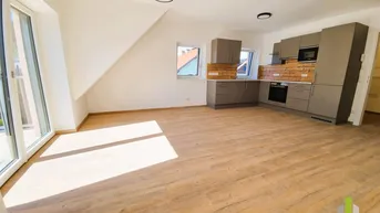 Expose Neubau! Moderne 2-Zi.-Dachgeschoß-Wohnung mit großen Balkon