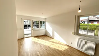 Expose WIE NEU! Sonnige 2-Zi.-Gartenwohnung mit Terrasse, Eigengarten und Carport