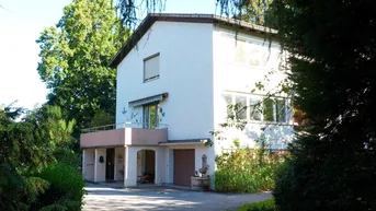Expose WOHNHAUS MIT GROSSZÜGIGER PARKLANDSCHAFT!